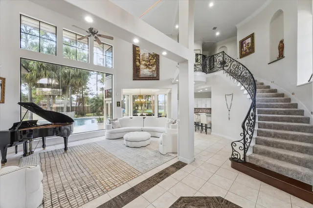 a view of living room with furniture and fireplace