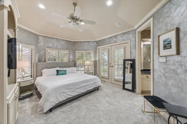 a bathroom with a granite countertop sink a mirror and shower