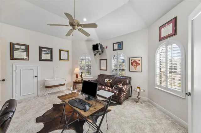 a bathroom with a shower and a sink