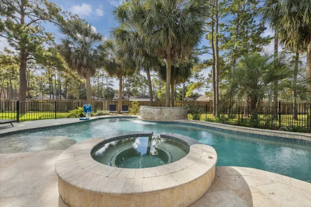 a view of a park with large trees