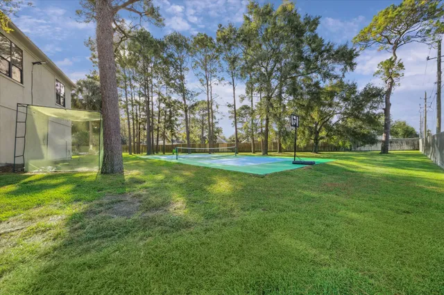 a front view of a house with a garden and porch