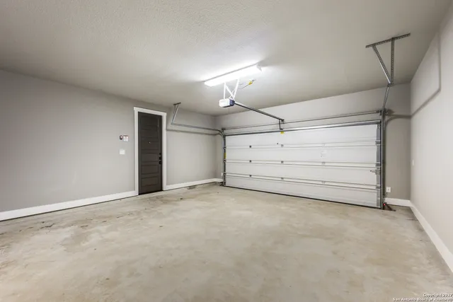 a view of room that has a bed and a walk in closet