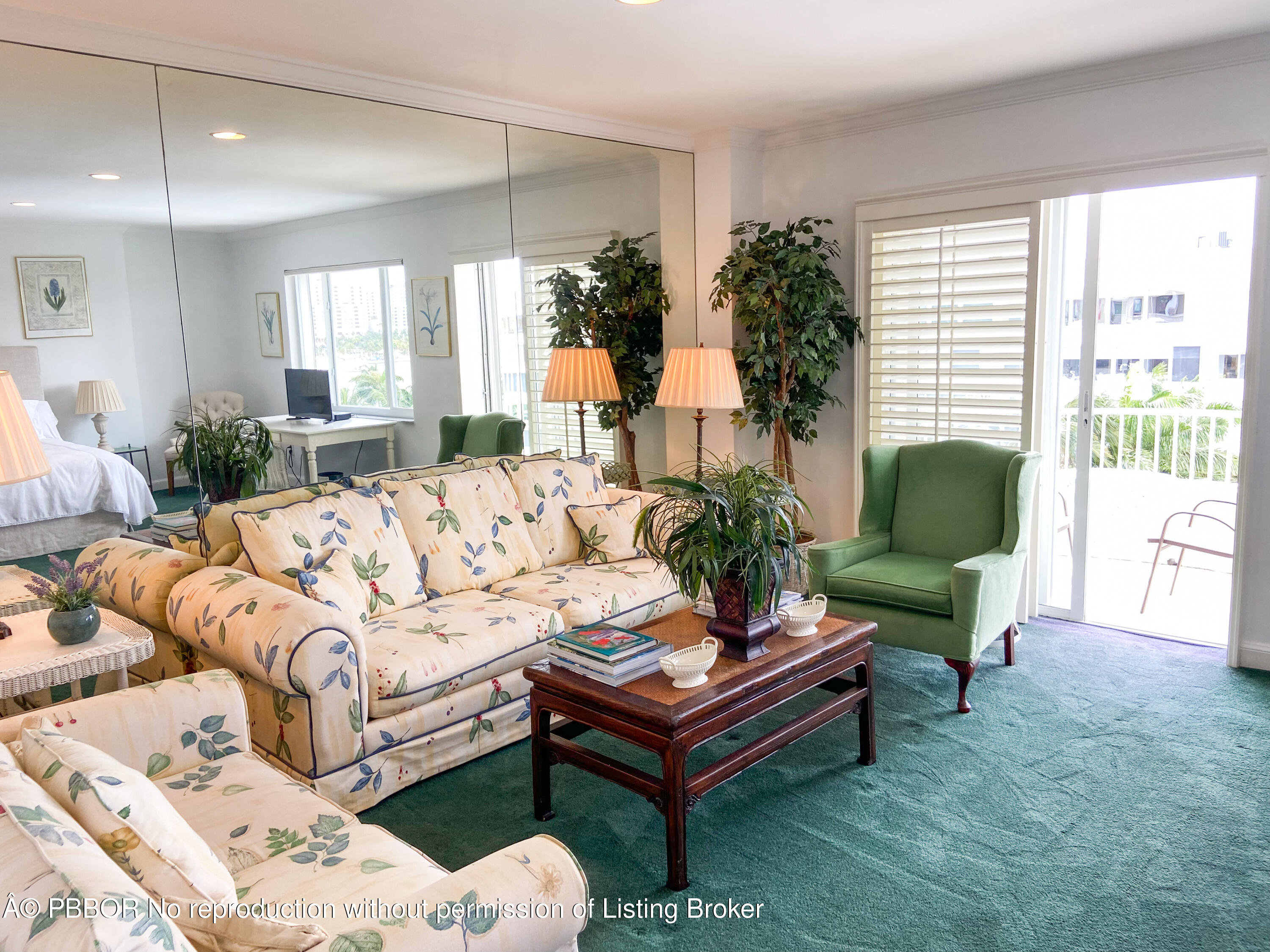 44 Cocoanut Row, Unit 610A Palm Beach, FL 33480 - Photo 4 of 13 a living room with furniture and a chair