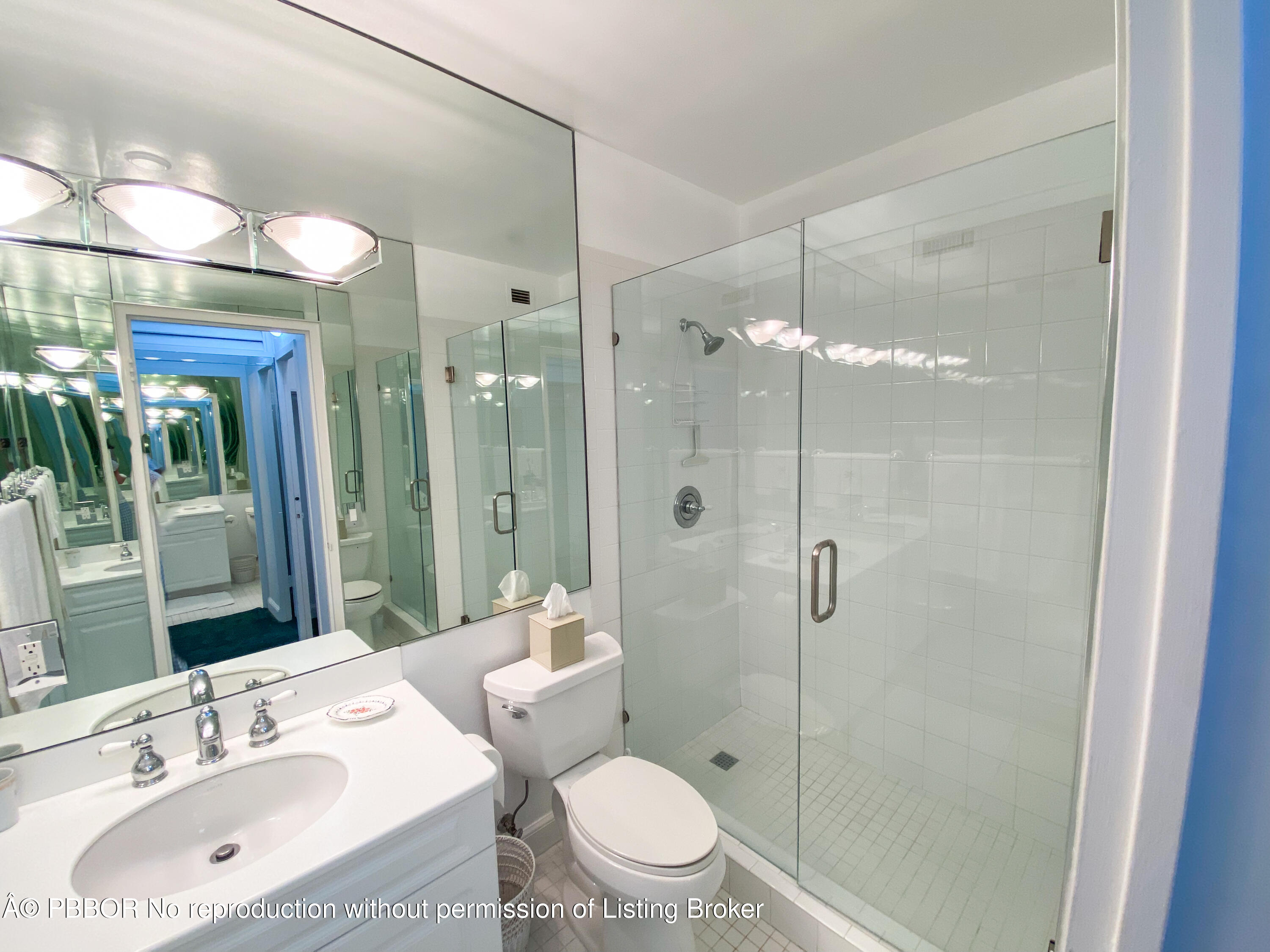44 Cocoanut Row, Unit 610A Palm Beach, FL 33480 - Photo 8 of 13 a bathroom with a sink toilet and shower