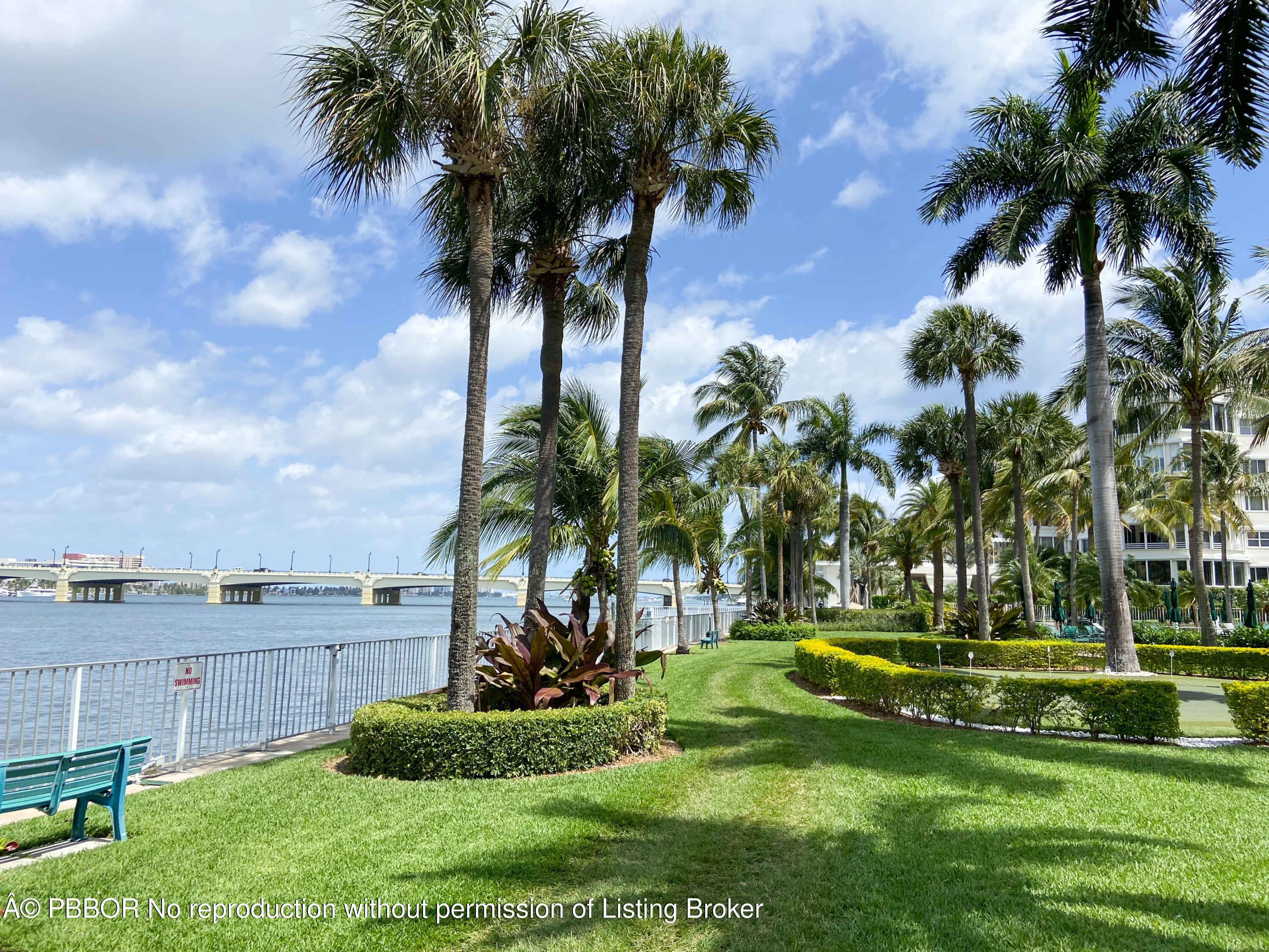 44 Cocoanut Row, Unit 610A Palm Beach, FL 33480 - Photo 9 of 13 a view of a yard and palm trees