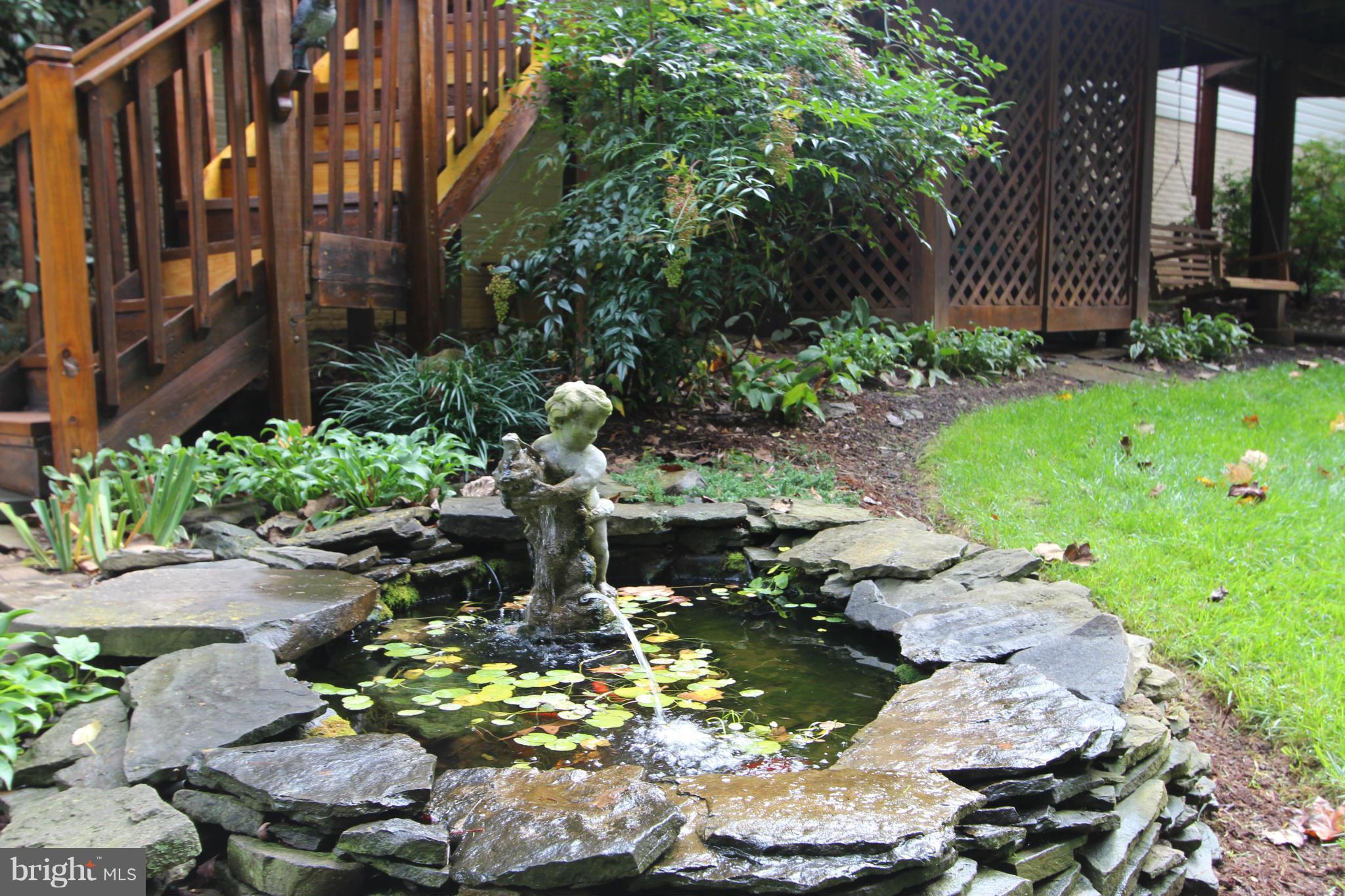 2808 Bree Hill Road Oakton, VA 22124 - Photo 4 of 29 Fountain and Koi Pond add to the Serenity