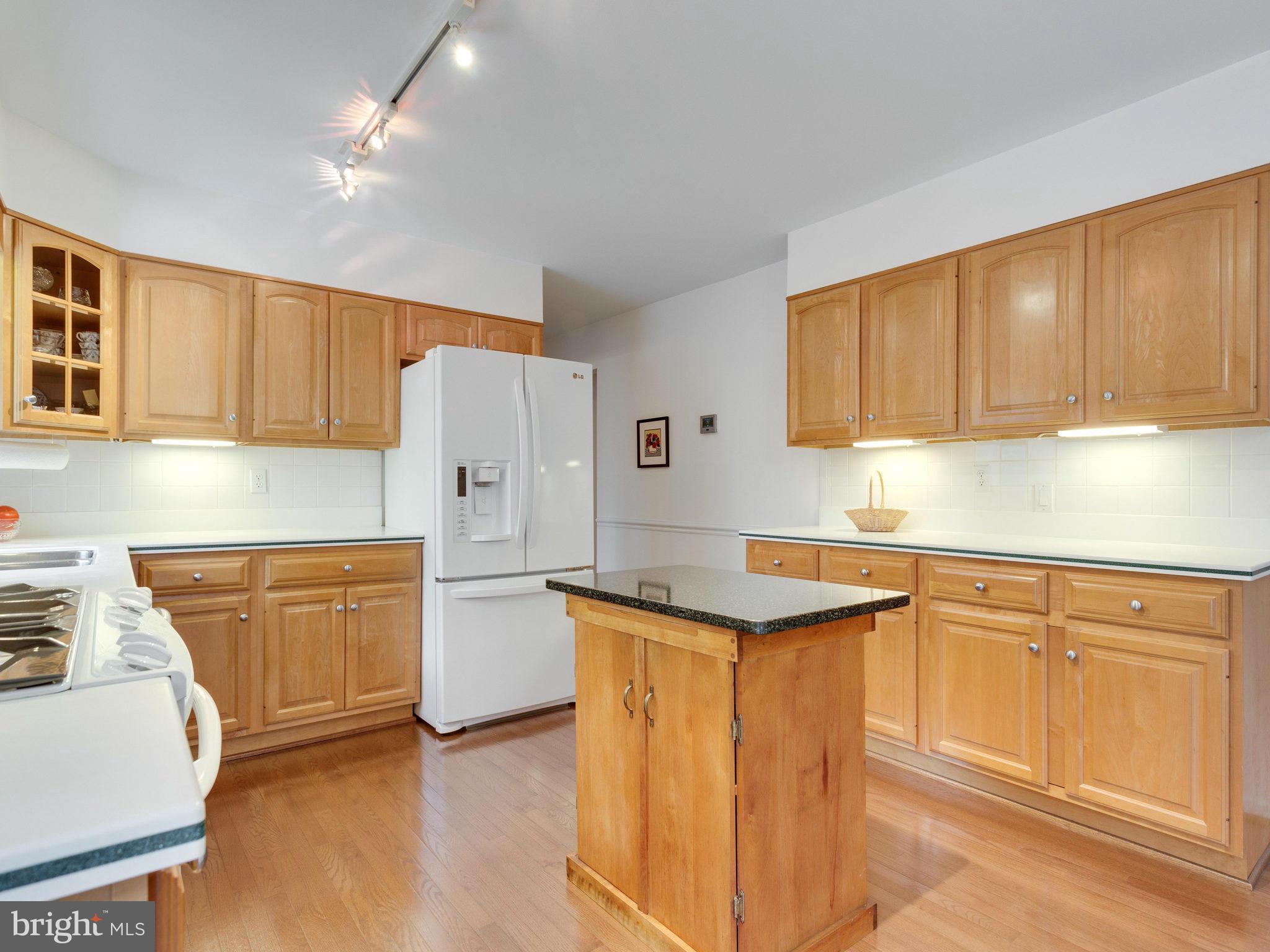 2808 Bree Hill Road Oakton, VA 22124 - Photo 10 of 29 An Abundance of Cabinetry in This Spacious Kitchen