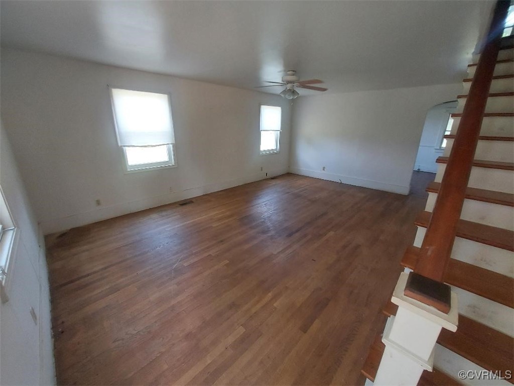 4870 Water View Road Water View, VA 23180 - Photo 4 of 14 Spare room with stairs, ceiling fan, wood finished