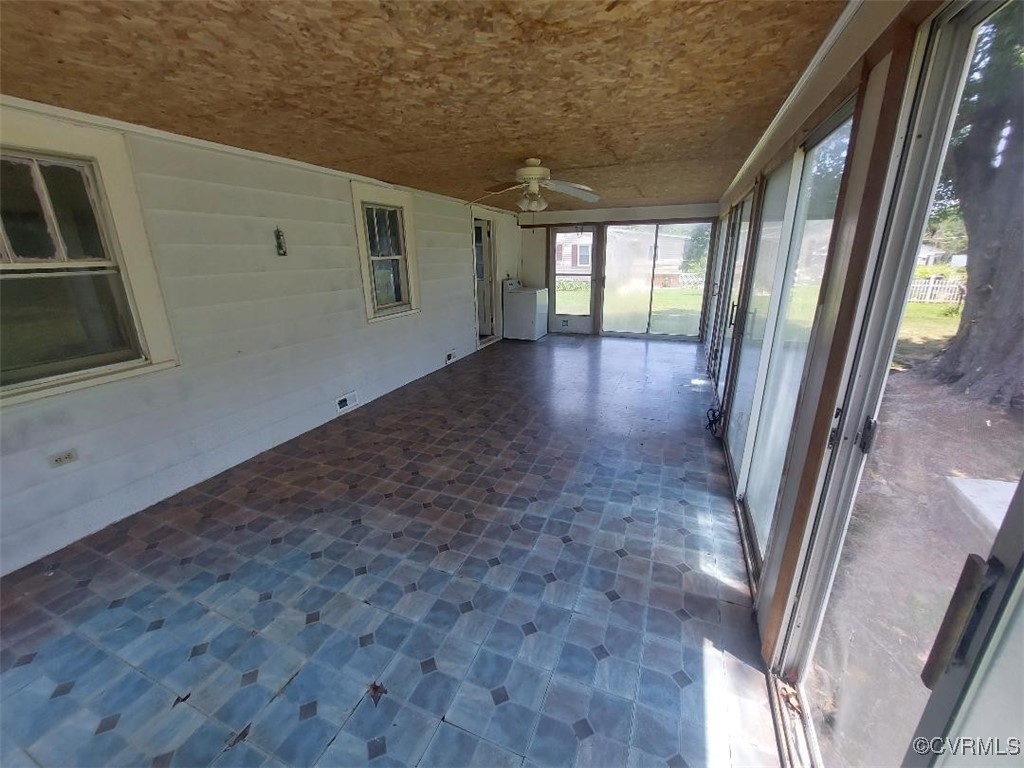 4870 Water View Road Water View, VA 23180 - Photo 7 of 14 Unfurnished sunroom with a ceiling fan
