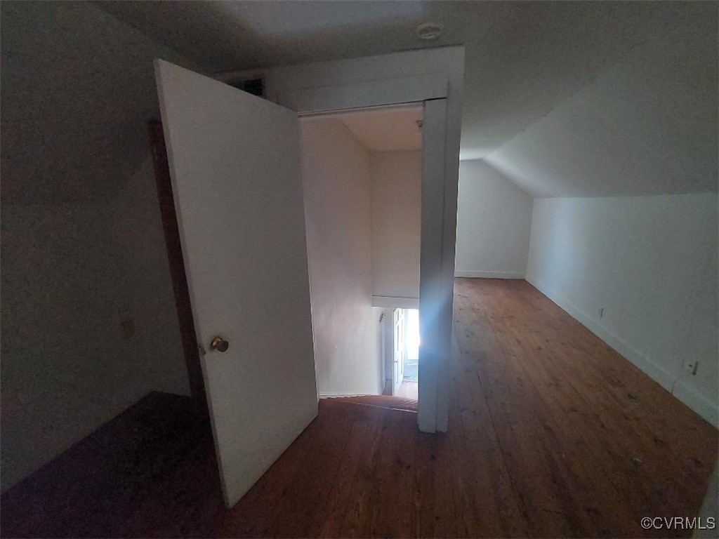 4870 Water View Road Water View, VA 23180 - Photo 10 of 14 Additional living space with vaulted ceiling and w