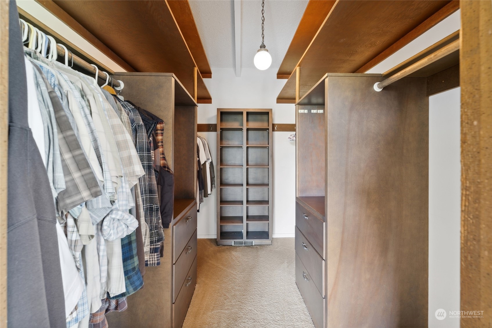 85017 Tum-A-Lum Road Milton Freewater, OR 97862 - Photo 11 of 40 a view of walk in closet with clothes and shoes