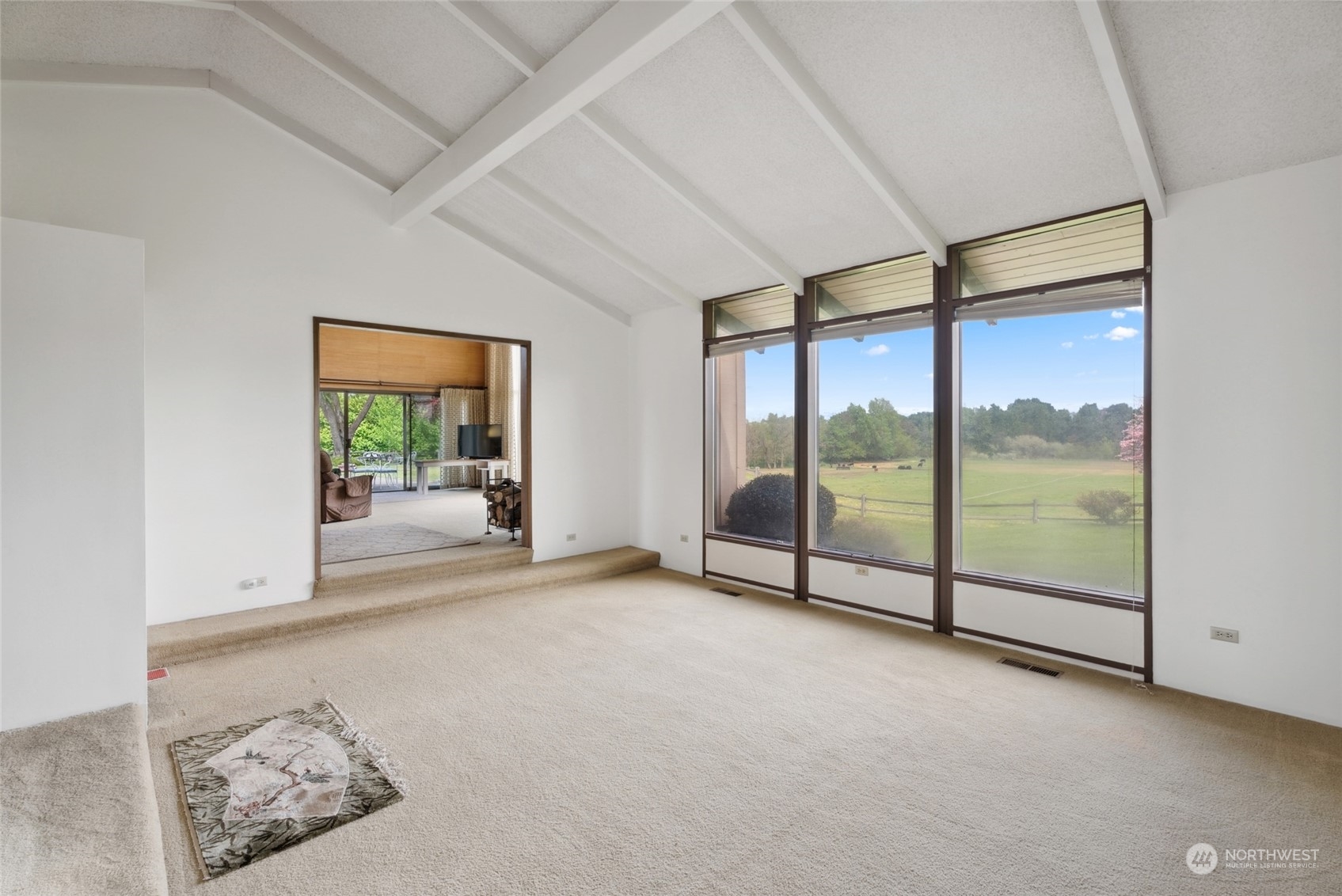 85017 Tum-A-Lum Road Milton Freewater, OR 97862 - Photo 20 of 40 an empty room with sliding glass door and glass door