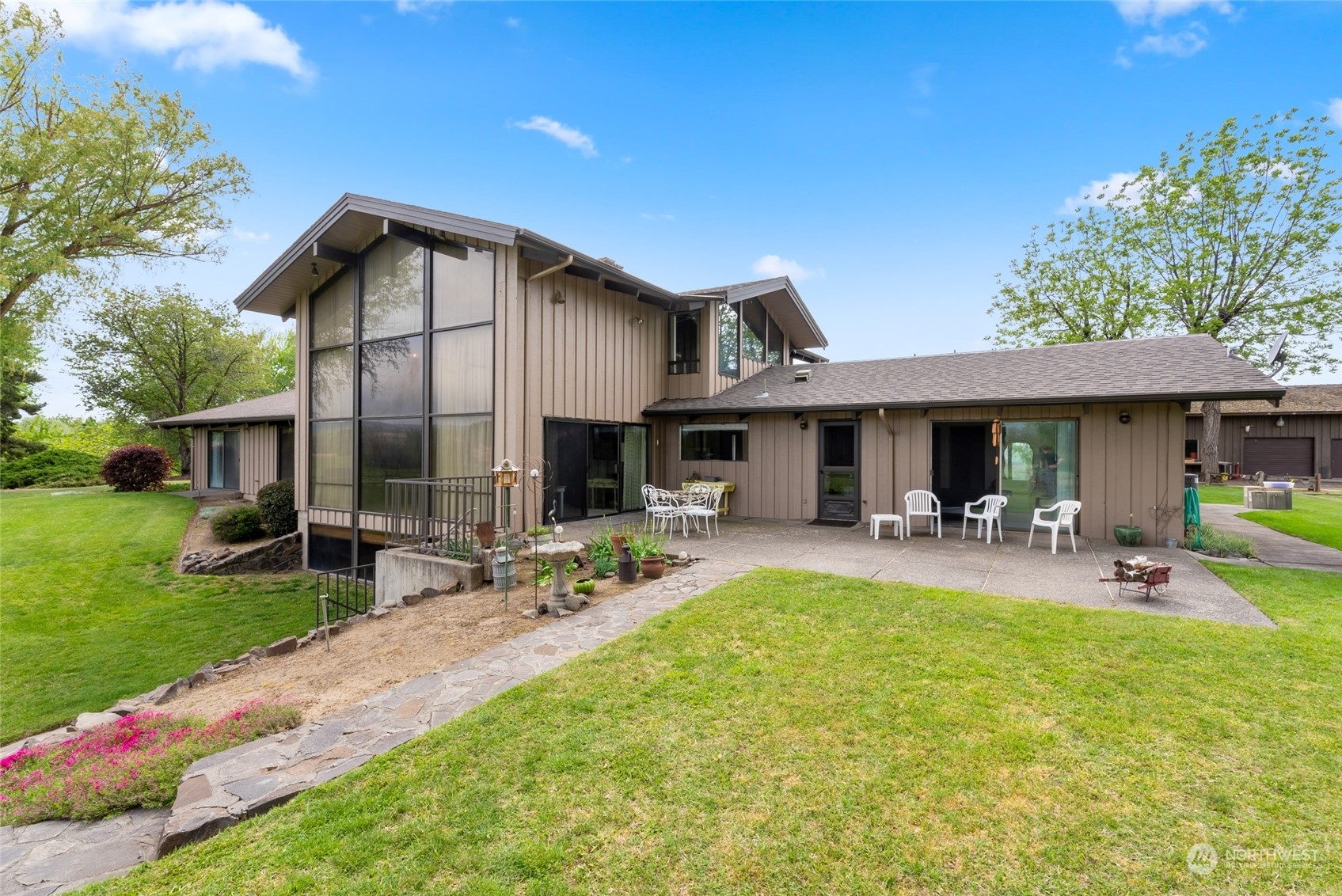 85017 Tum-A-Lum Road Milton Freewater, OR 97862 - Photo 33 of 40 a front view of house with yard and outdoor seating