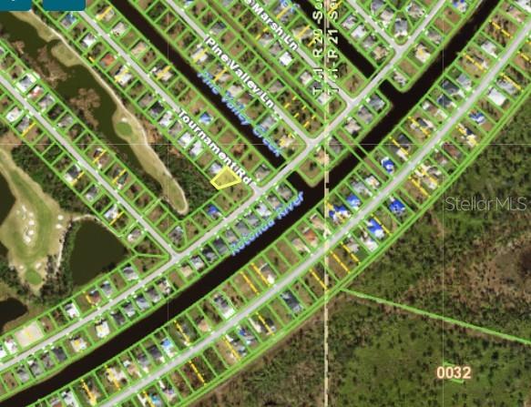 4 Tournament Road Rotonda West, FL 33947 - Photo 3 of 3 a close up of a street
