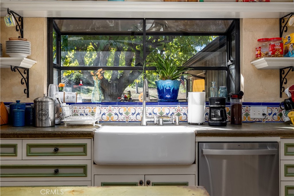24105 Carancho Road Temecula, CA 92590 - Photo 14 of 49 Main house kitchen with farm style sink and garden window