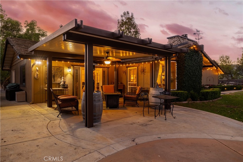 24105 Carancho Road Temecula, CA 92590 - Photo 5 of 49 Covered patio at front of main house facing pool and view of landscaped property