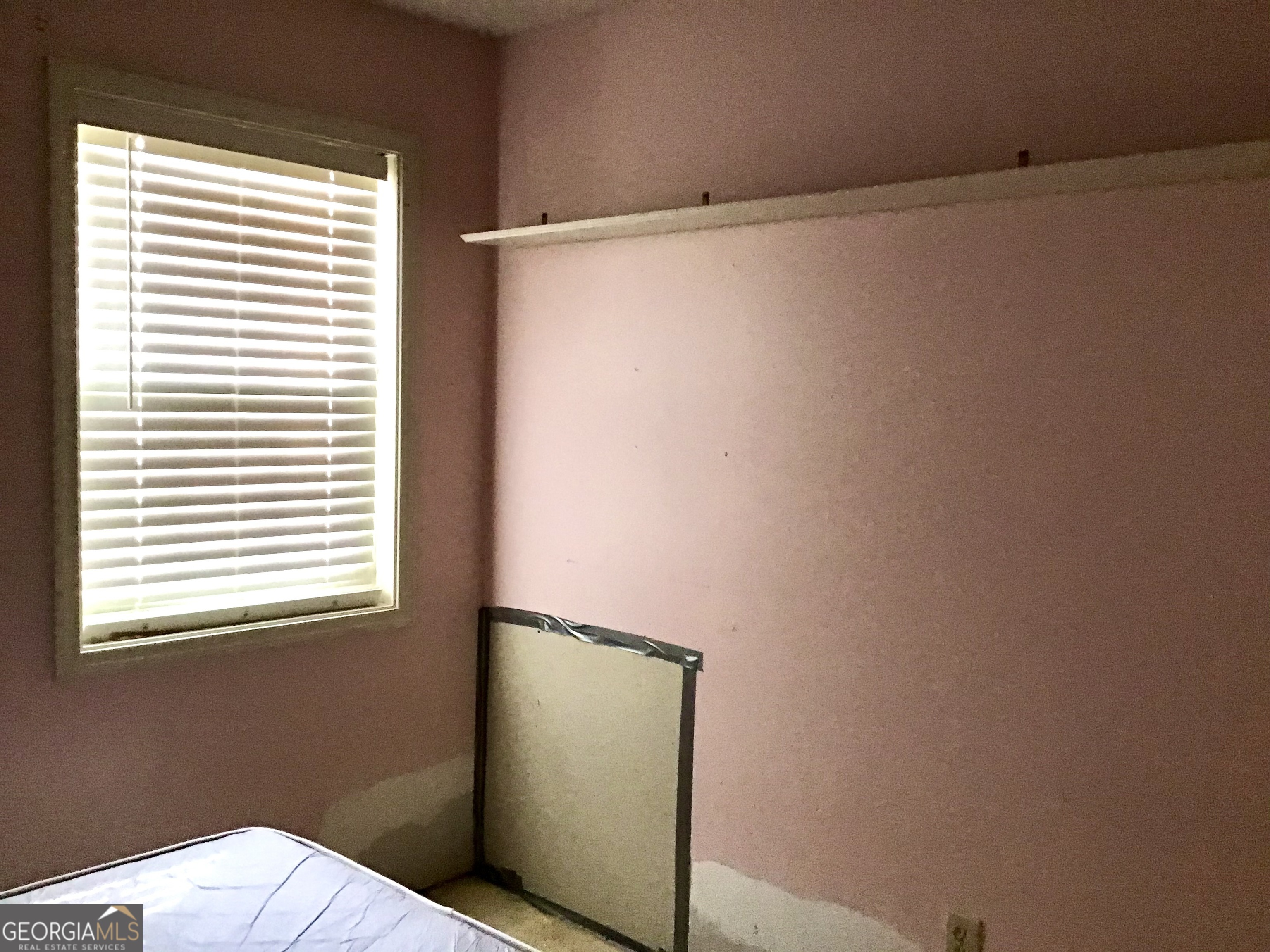 8363 Norris Lake Road Snellville, GA 30039 - Photo 21 of 28 a view of a room that has a window in it