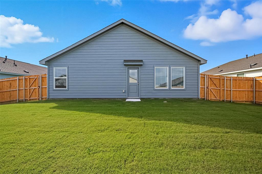 3707 Spring Run Drive Sherman, TX 75092 - Photo 16 of 18 a view of a house with a backyard