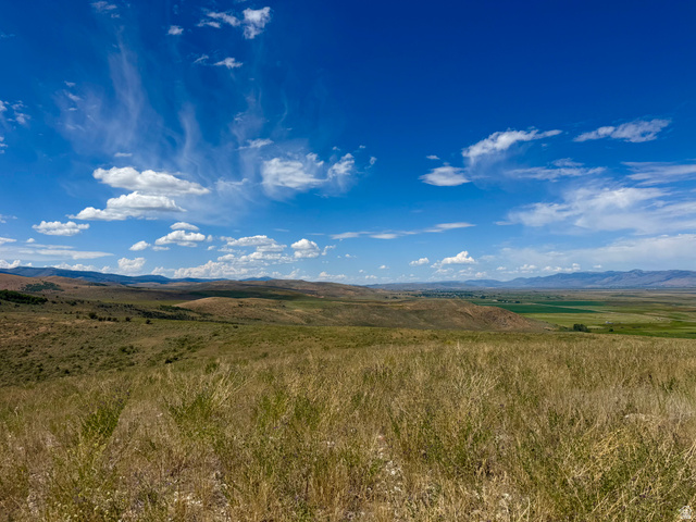160 Dry Canyon St. Charles, ID 83272 - Photo 26 of 63 Expansive natural landscape featuring rolling hills and distant mountains