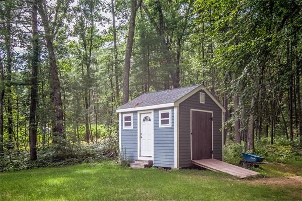 140 Waite Road Boxborough, MA 01719 - Photo 17 of 21 front view of a house with a yard