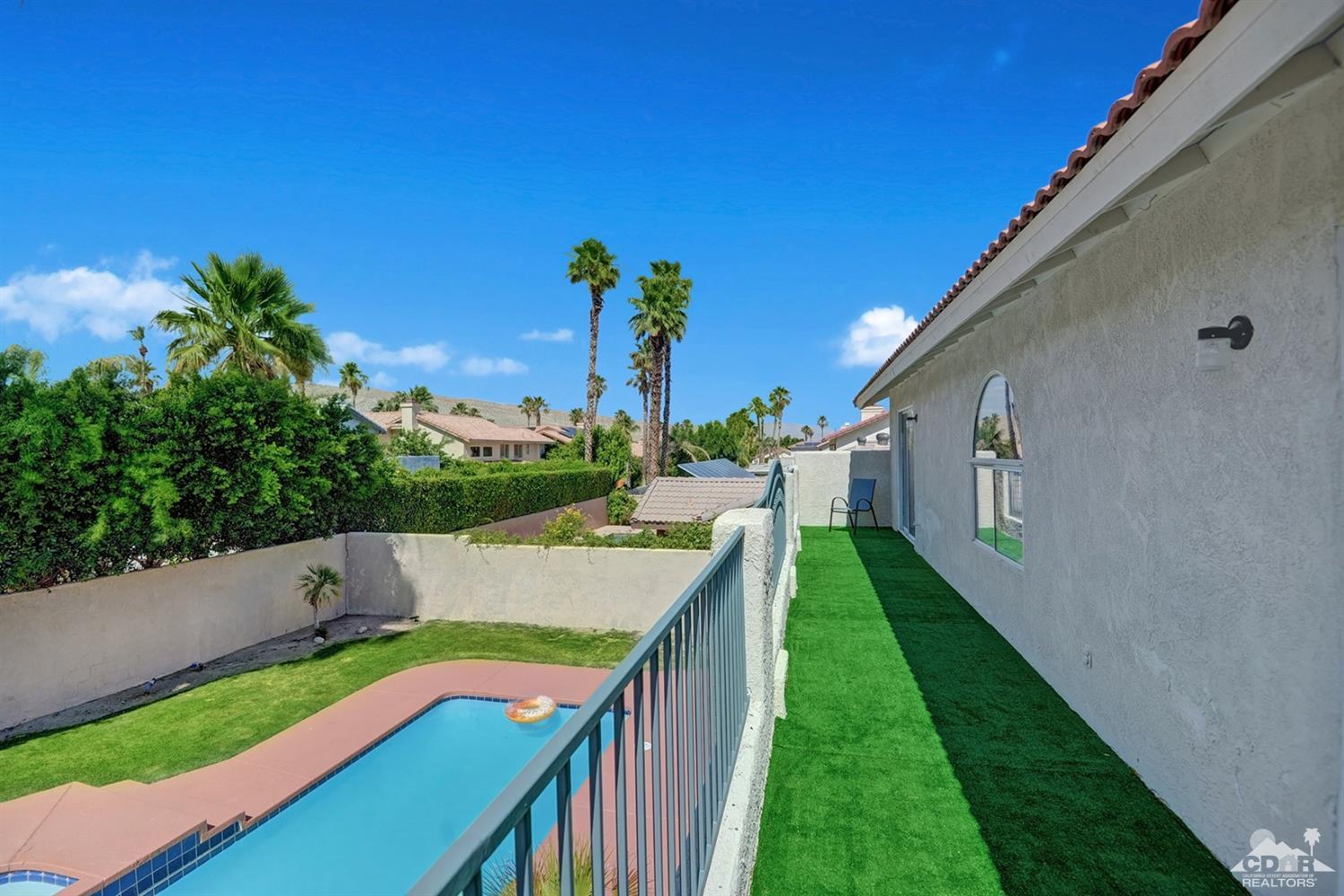 68710 Raposa Road Cathedral City, CA 92234 - Photo 15 of 29 a view of an outdoor space and a yard