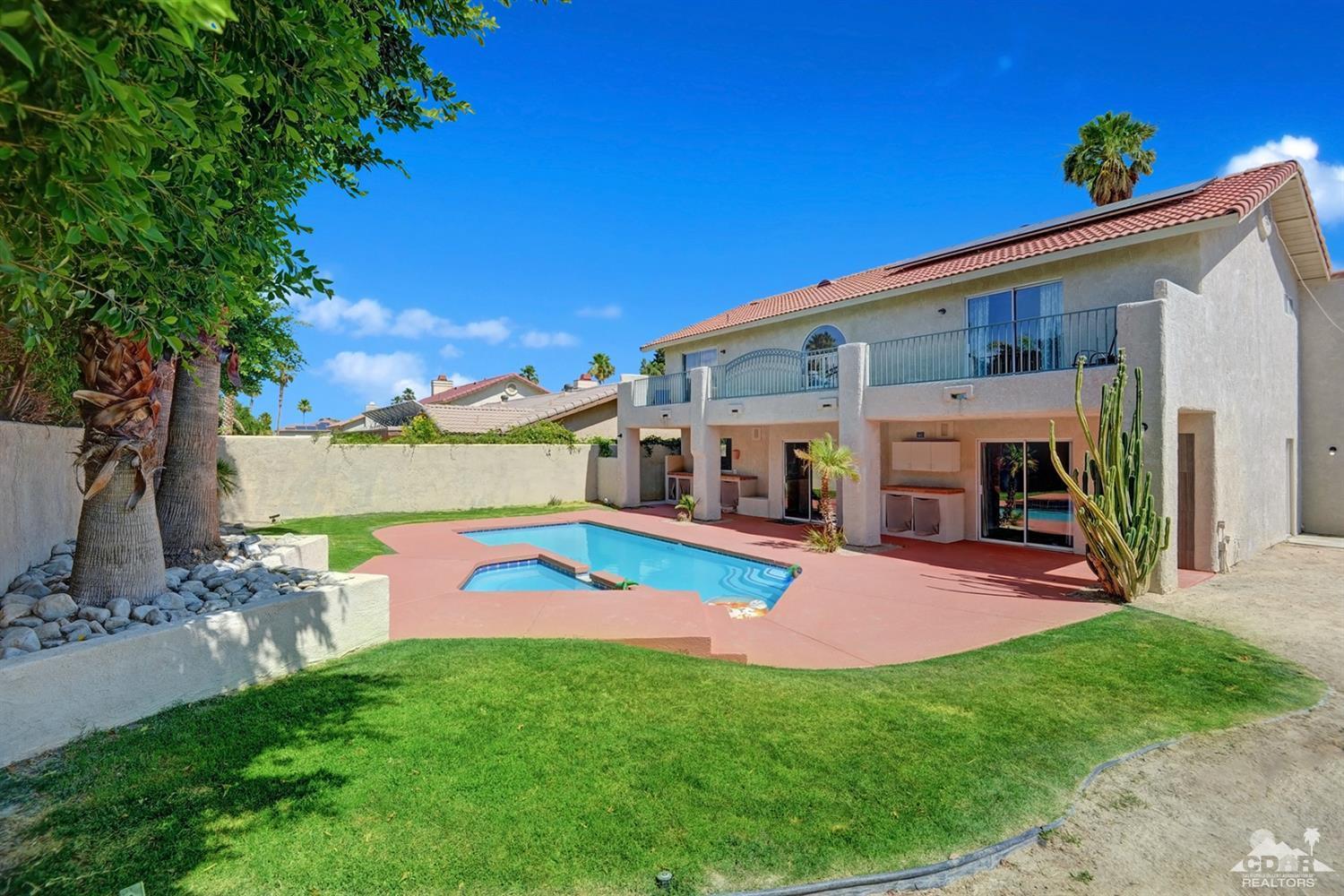 68710 Raposa Road Cathedral City, CA 92234 - Photo 25 of 29 a view of an house with backyard and patio