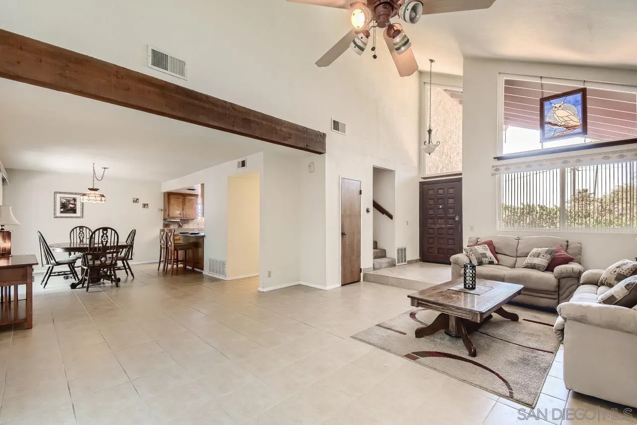 396 El Monte Road El Cajon, CA 92020 - Photo 5 of 18 a living room with furniture and a chandelier