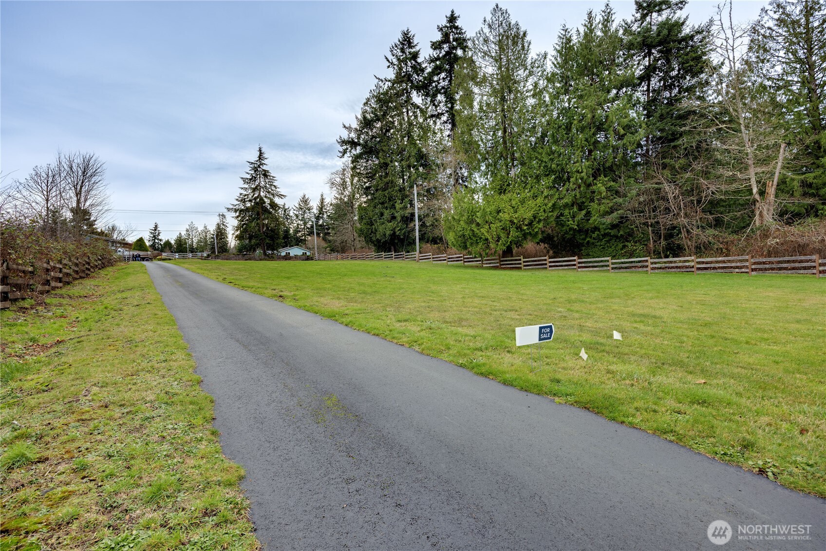 0 Northeast Jefferson Point Road Kingston, WA 98346 - Photo 17 of 21 a view of a golf course with a lake