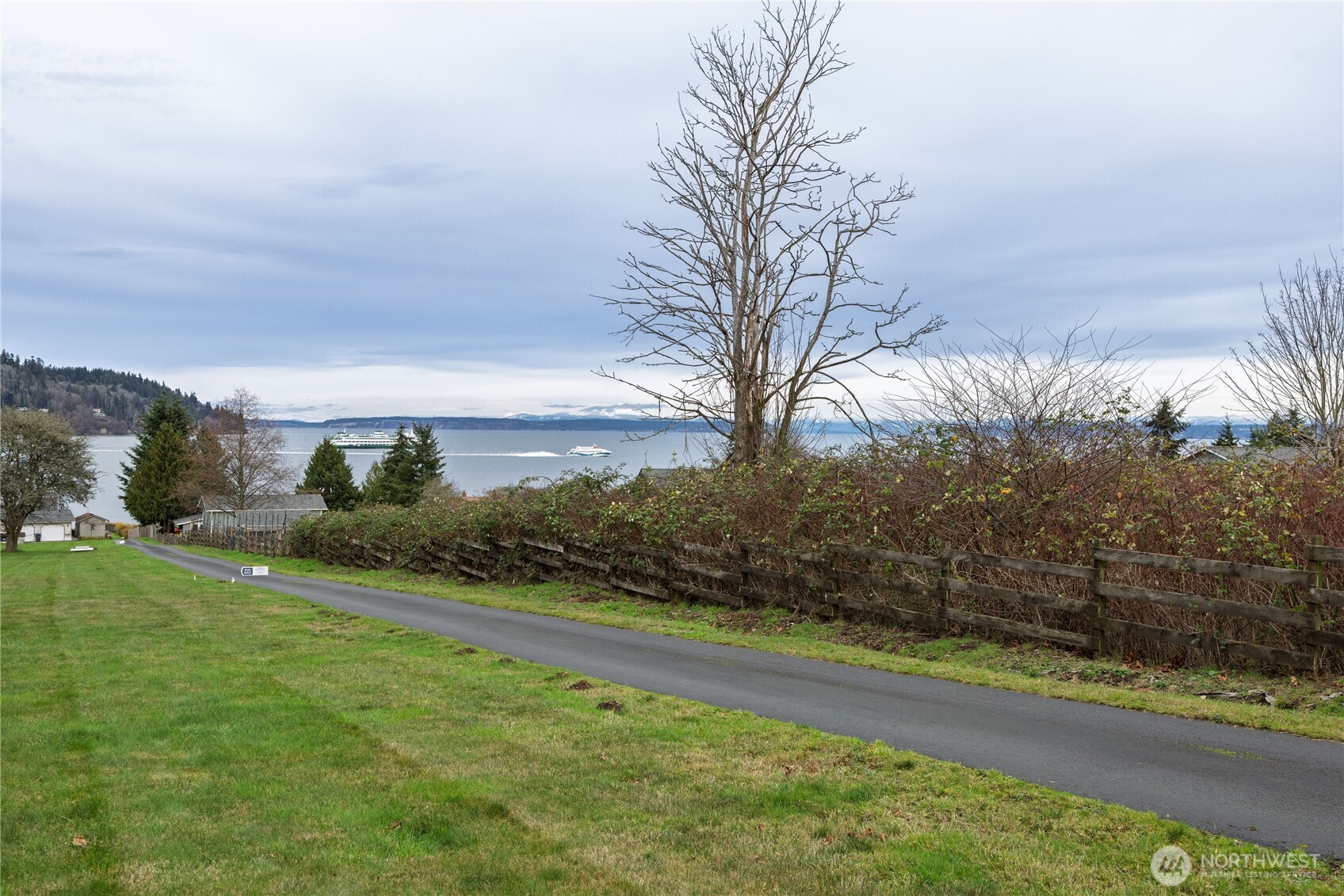 0 Northeast Jefferson Point Road Kingston, WA 98346 - Photo 19 of 21 a view of a yard with an trees