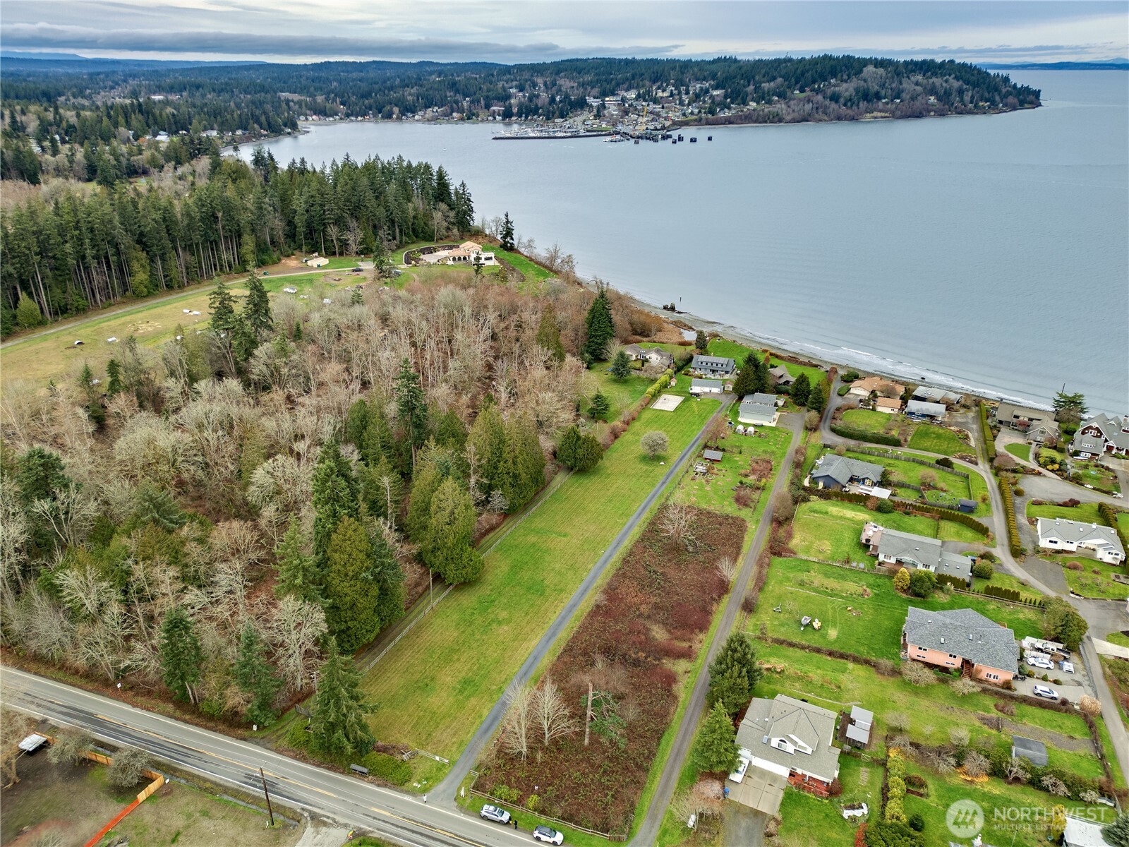 0 Northeast Jefferson Point Road Kingston, WA 98346 - Photo 7 of 21 a view of a lake with a city view