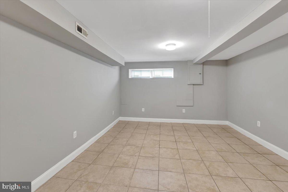 74 South Kossuth Street Baltimore, MD 21229 - Photo 13 of 18 a view of an empty room