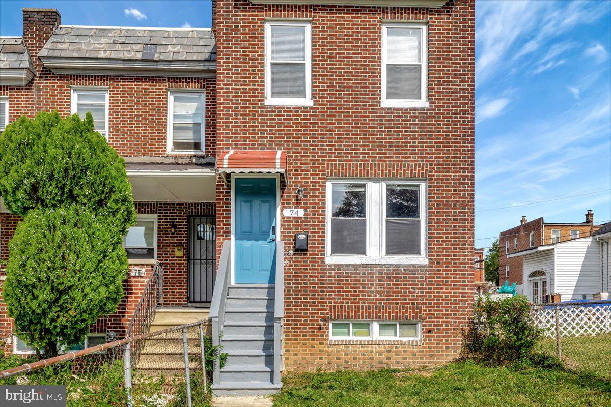 74 South Kossuth Street Baltimore, MD 21229 - Photo 16 of 18 front view of a brick house