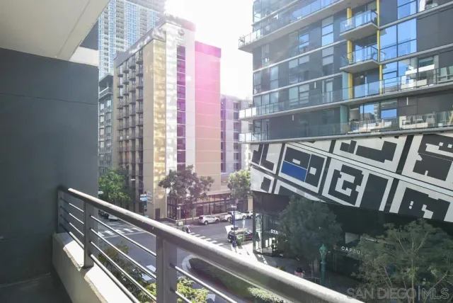 a view of buildings from balcony