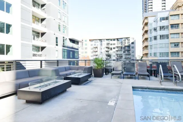 a view of dinning table and chairs in the patio