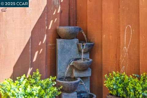 a view of a dining room with furniture wooden floor and chandelier