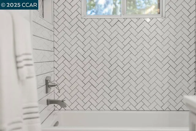 a view of a city with mountains in the background