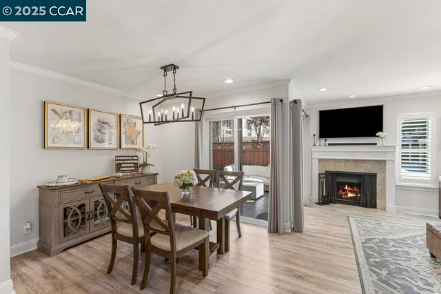 a view of a livingroom with furniture and a fireplace