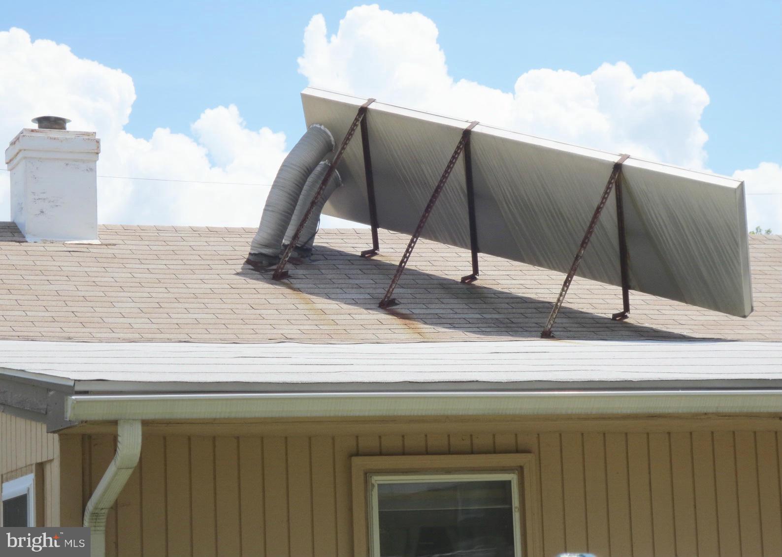 2210 Chapman Road Hyattsville, MD 20783 - Photo 27 of 30 Solar Panel for heating the family room/ bedroom