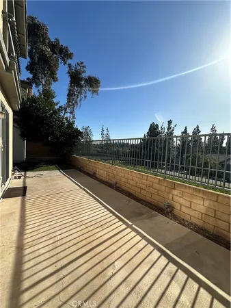 a view of a balcony with an outdoor space