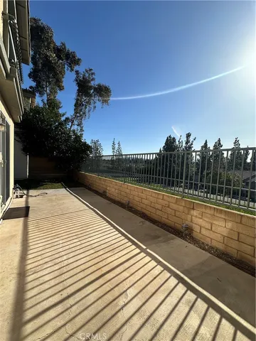 a view of a balcony with an outdoor space