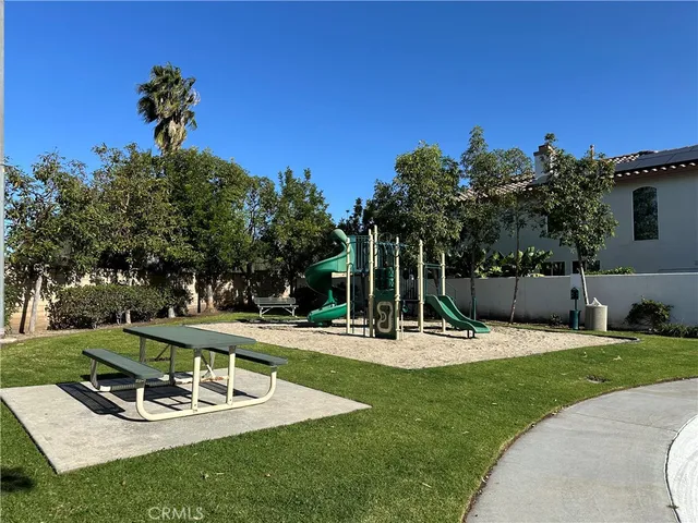 a view of a swimming pool with a yard