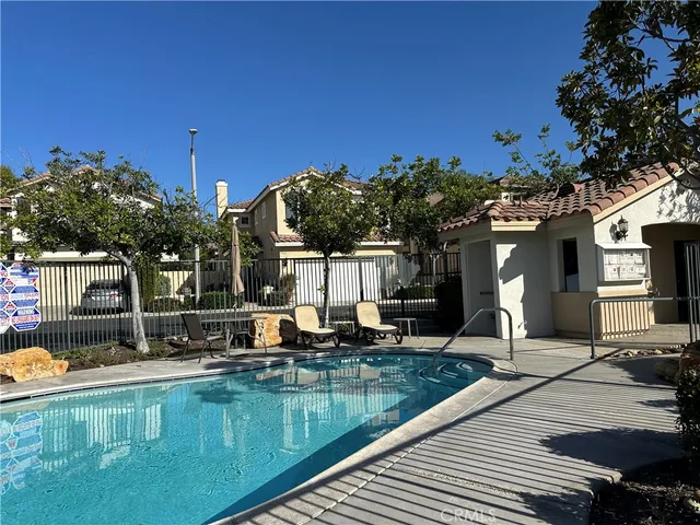 a view of a house with a swimming pool