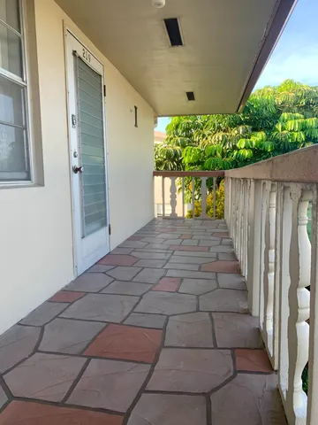 a view of entryway with a front door