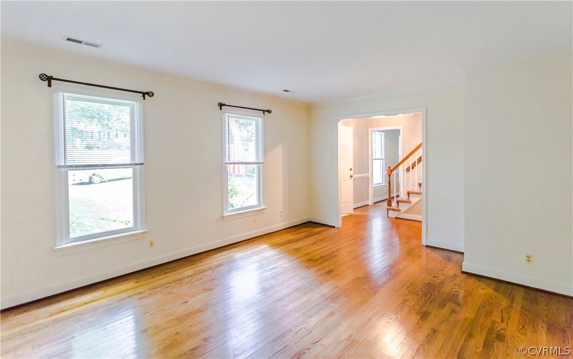 5111 Rock Harbour Road Midlothian, VA 23112 - Photo 11 of 50 a view of empty room with wooden floor and fan