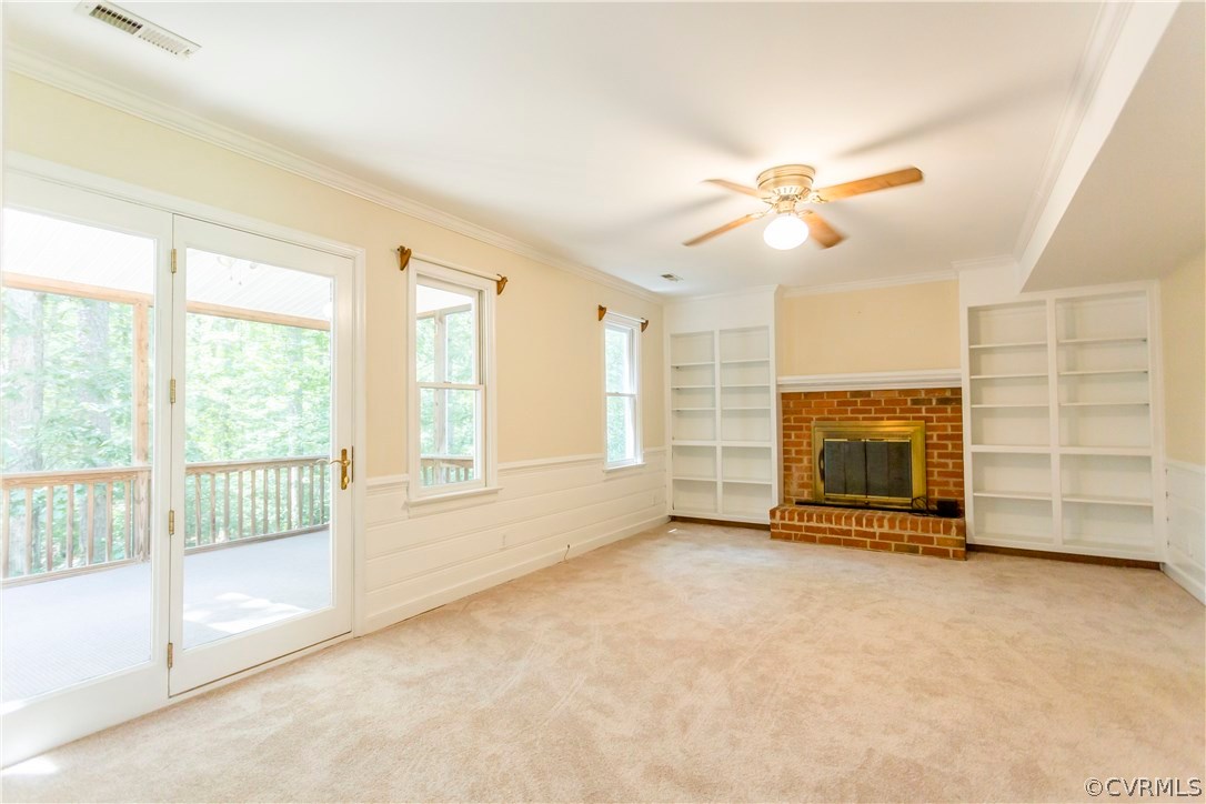 5111 Rock Harbour Road Midlothian, VA 23112 - Photo 13 of 50 a view of an empty room with a fireplace and a window