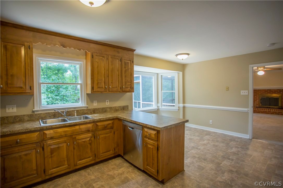 5111 Rock Harbour Road Midlothian, VA 23112 - Photo 19 of 50 a kitchen with sink a window and cabinets