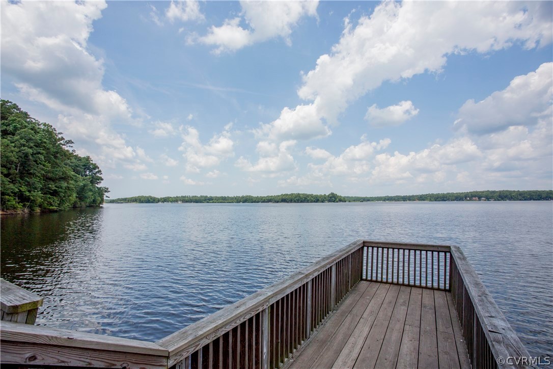 5111 Rock Harbour Road Midlothian, VA 23112 - Photo 2 of 50 a view of outside patio of house and lake