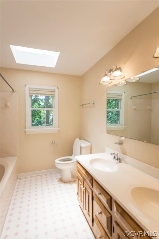 5111 Rock Harbour Road Midlothian, VA 23112 - Photo 24 of 50 a bathroom with a double vanity sink toilet and a window