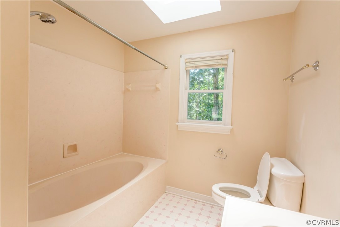 5111 Rock Harbour Road Midlothian, VA 23112 - Photo 25 of 50 a bathroom with a bathtub and window