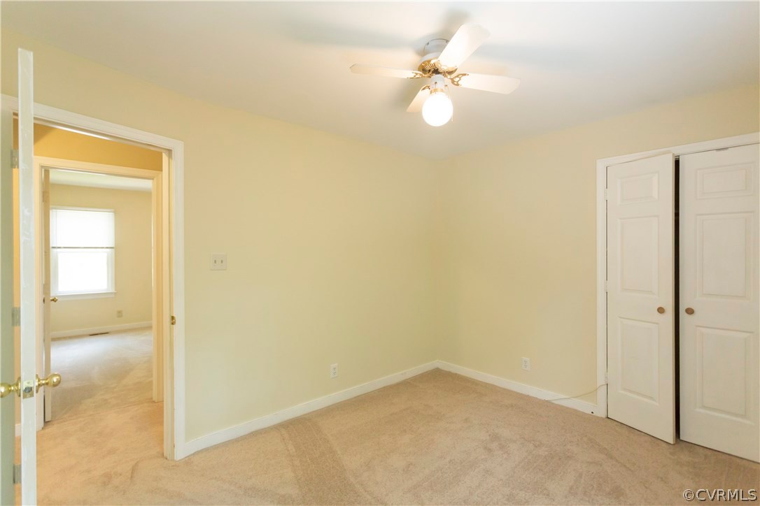 5111 Rock Harbour Road Midlothian, VA 23112 - Photo 29 of 50 an empty room with a fan